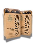 שני מארזי בונבון אישי בשרוול קראפט עם חיתוך עלה דקל, זה לצד זה